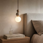 Suspension grappe de boules en travertin, accent bois, LED incluse
