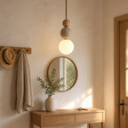 Suspension grappe de boules en travertin, accent bois, LED incluse