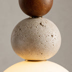 Suspension grappe de boules en travertin, accent bois, LED incluse
